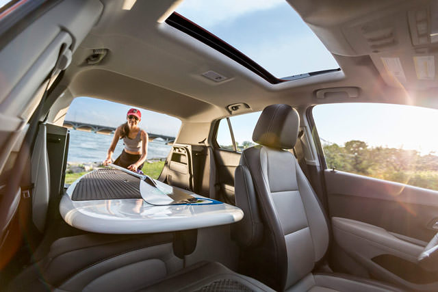 A 60/40-split, flat-folding rear seat and a fold-flat front passenger seat combine to allow storage of long items such as skis or a surfboard, up to eight feet long.
