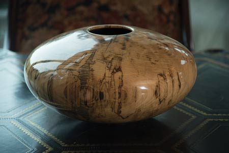 A handmade bowl carved from a fallen hackberry tree at Augusta National