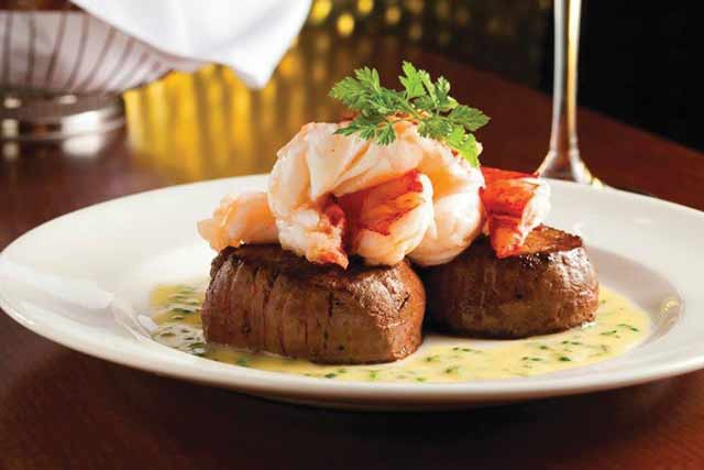 Seared Tenderloin with Butter Poached Lobster Tails from Capital Grille