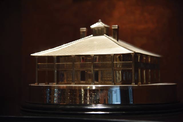 A trophy featuring the Augusta National clubhouse
