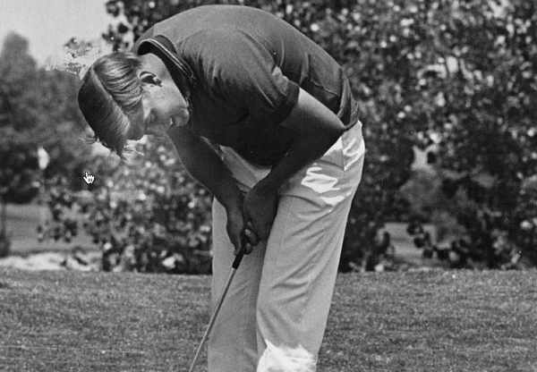 John Hamer sinks a putt