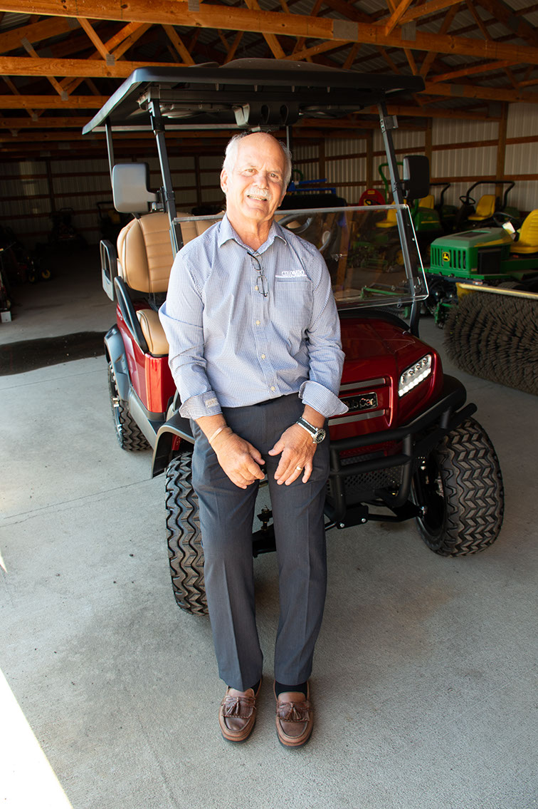 Tom Bauerle with a "lifted" Onward Club Car.