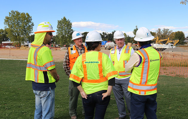 Hale Irwin (second from right) and the program team at the City Park Golf Course in Denver (courtesy of Saunders Construction)