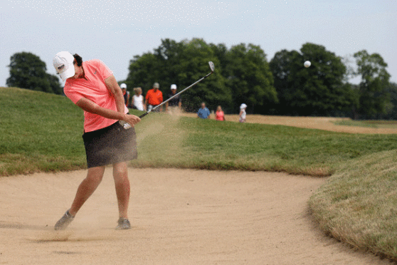 Moore competed in his year's U.S. Senior Women's Open at Chicago Golf Club.