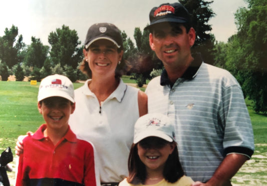 Colorado Golf Hall of Famers Janet and Kent Moore in 2001 with children Sarah and Steven.