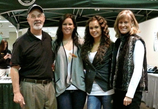 Denver Golf Expo owners Mark and Lynn Cramer at the show with daughters Corinne and Rachel.
