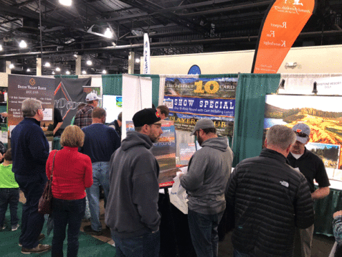 Devotees check out the Green Valley Ranch Golf Club booth at the Denver Golf Expo.