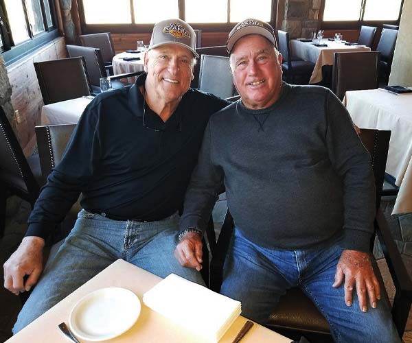 PAIR OF POKES: Howe and Dan Adair played baseball together at the University of Wyoming.