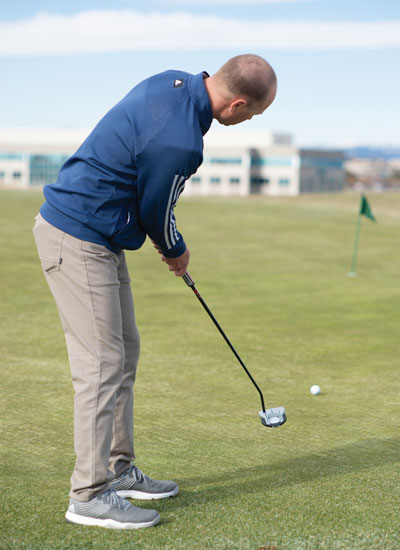 Trent Wearner practicing around the greens