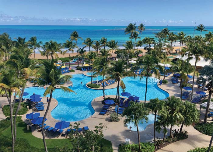 IN THE SWIM: Wyndham Grand Rio Mar’s pool complex lies just beyond the ocean.