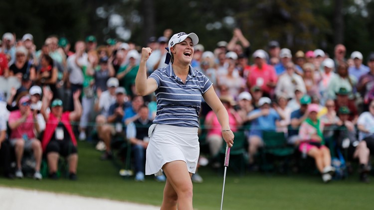 Kupcho celebrates her birdie putt on the 18th green. (photo courtesy of David Goldman/AP)