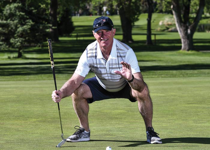 KNOWING SQUAT: The former All-Star catcher strikes a familiar pose at Meadow Hills.