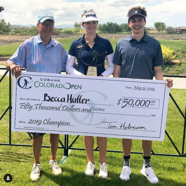 Huffer with her caddie and brother Zach and the 50,000 winner's check.