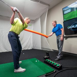 A golfer gets a swing evaluation at GOLFTEC.