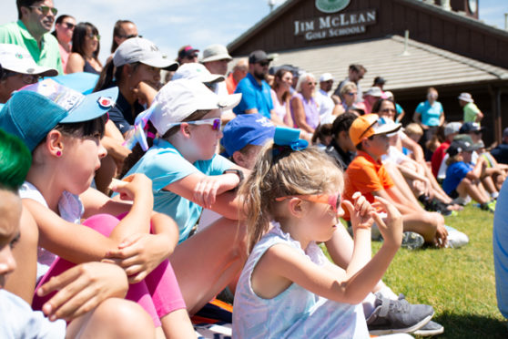 Young attendees watch Jennifer Kupcho at The First Tee of Green Valley Ranch.