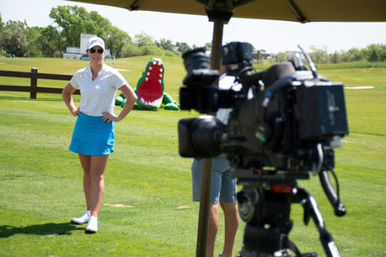 Cameras captured Kupcho before she addressed the kids from the First Tee