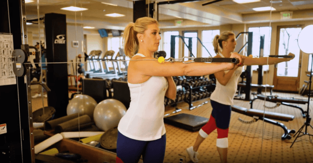 Elizabeth Martin executes the Cable Rotation Press exercise.