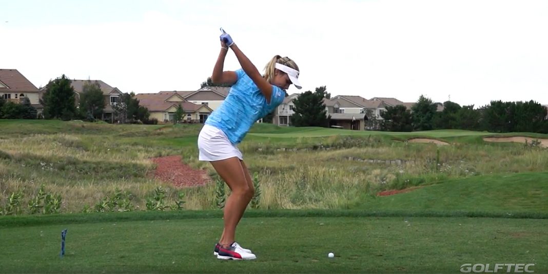 Lexi Thompson rips a drive down the middle of the fairway.