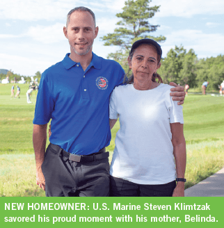 U.S. Marine Steven Klimtzak savored his proud moment with his mother, Belinda.