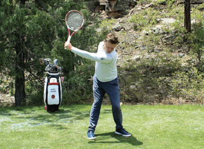 Alex Fisher demonstrates the first phase of a fade technique drill with a tennis racket. 