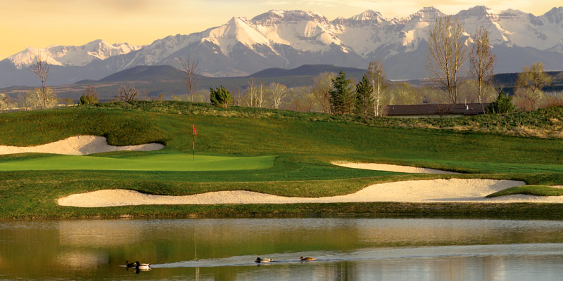 The Bridges Golf Club in Montrose with the San Juan Mountains in the background.