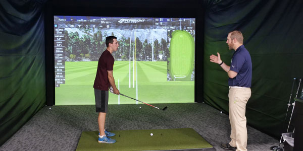 Inside a hitting bay at PGA TOUR Superstore