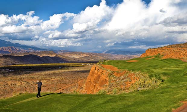 A golfer tees off on Sand Hollow's Championship Course