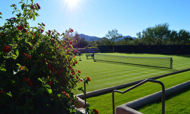 Grass tennis court at Desert Highlands