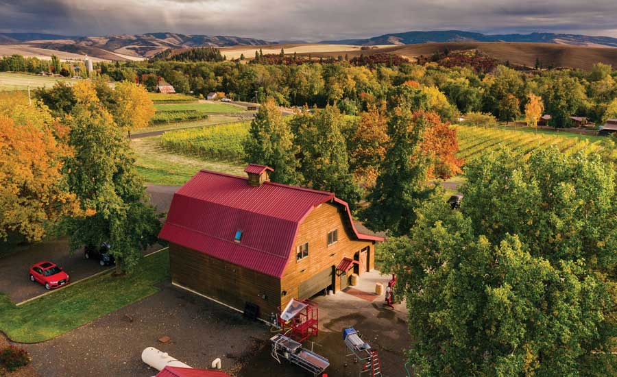 Walla Walla Vintners conducts tastings of its award-winning vintages in its iconic red-roofed barn nestled within the vineyards of Cut Bank Estate.