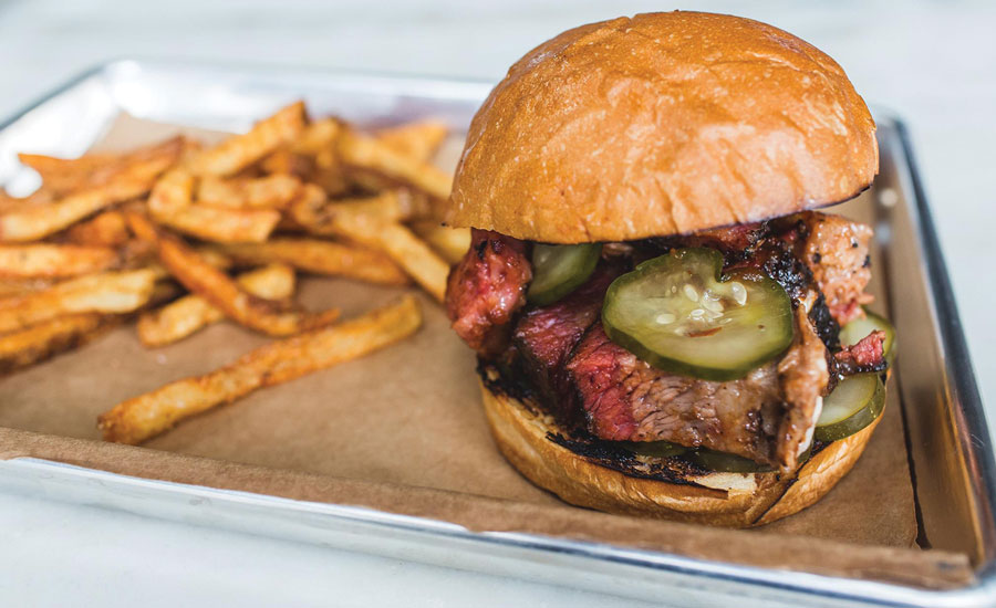 Smok’s Burnt Ends taste best tucked into a warm brioche with housemade pickles.