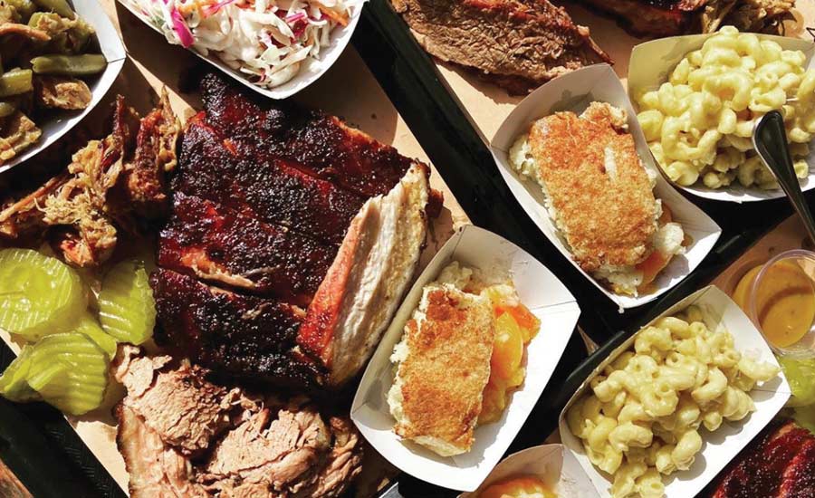 WAYNE’S WORLD: Pounds of assorted bbq deliciousness await at Wayne’s Smoke Shack, where St. Louis pork rib, smoked brisket, spice-crusted juicy turkey breast and mountains of sides carry the day.