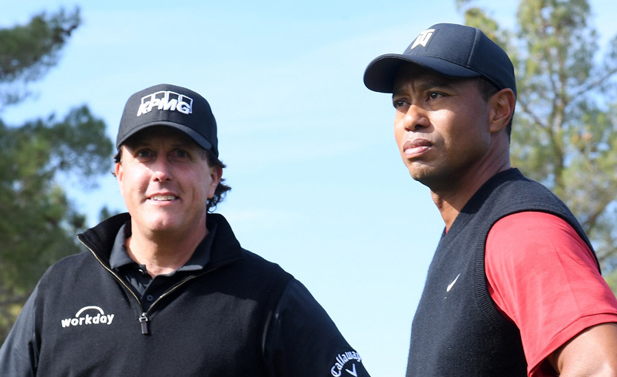 Phill and Tiger Compete in Charity for Champions