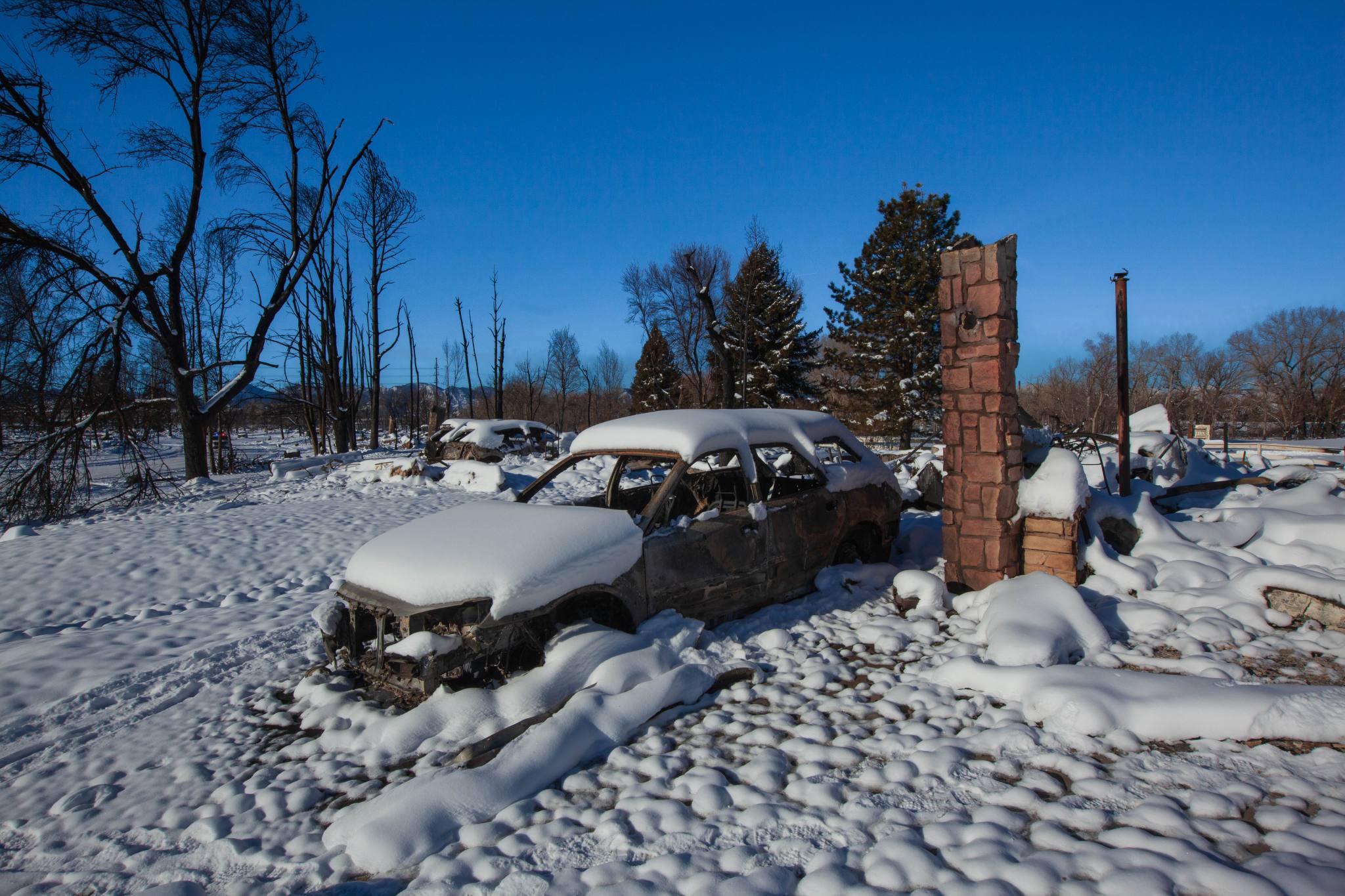 burned car and chimney