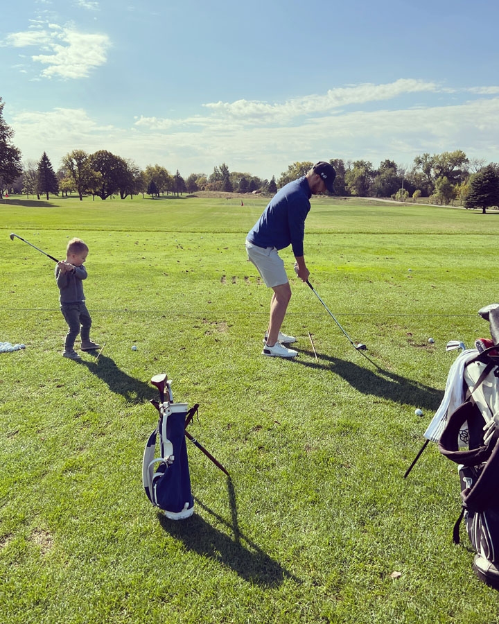 Tyler Johnson with son Charlie on the range